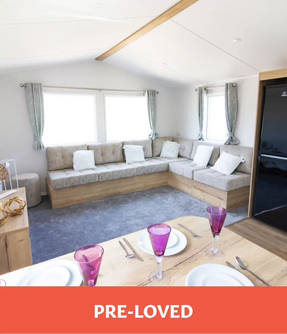 Spacious living and dining area in a pre-loved holiday home for sale at Billing Aquadrome