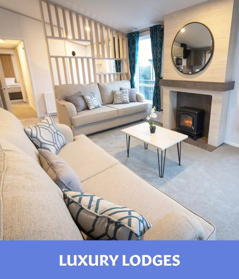Luxury holiday lodge interior with cosy seating, fireplace and modern decor Billing Aquadrome