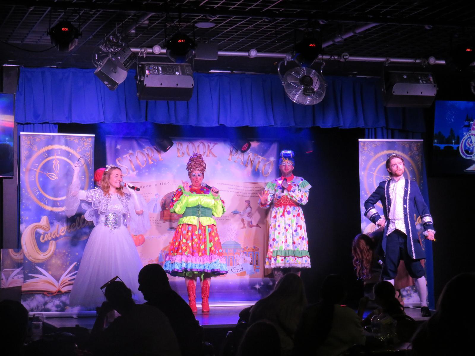 Actors performing live on stage during a Cinderella pantomime show at Billing Aquadrome