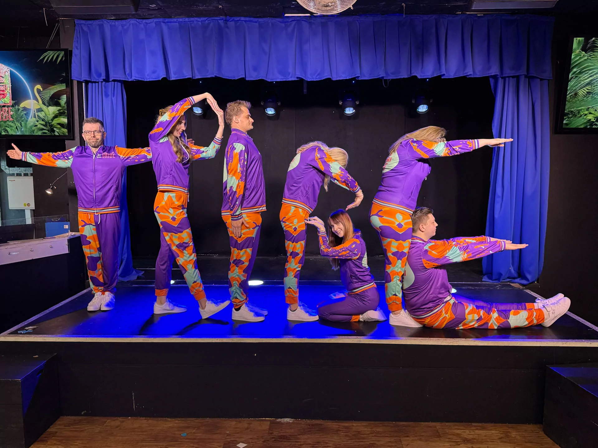 The Tribe entertainment team performing a fun stage show for guests at Billing Aquadrome