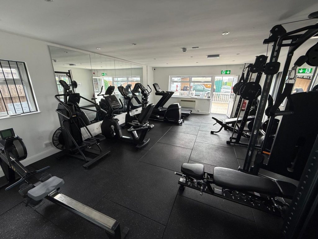 Modern indoor gym and fitness center equipment at Golden Leas