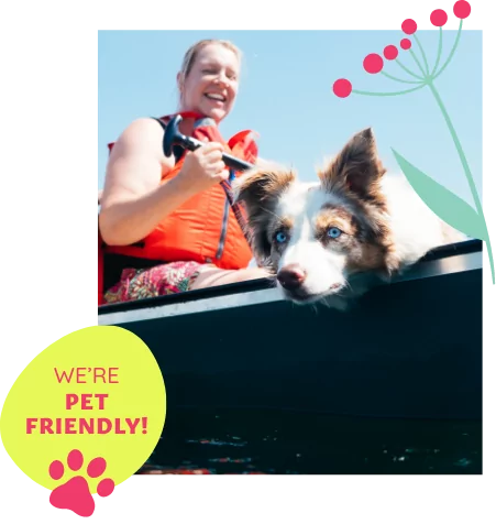 Woman paddling a canoe with her happy dog beside her, both enjoying a sunny day on the water, with pet-friendly badge