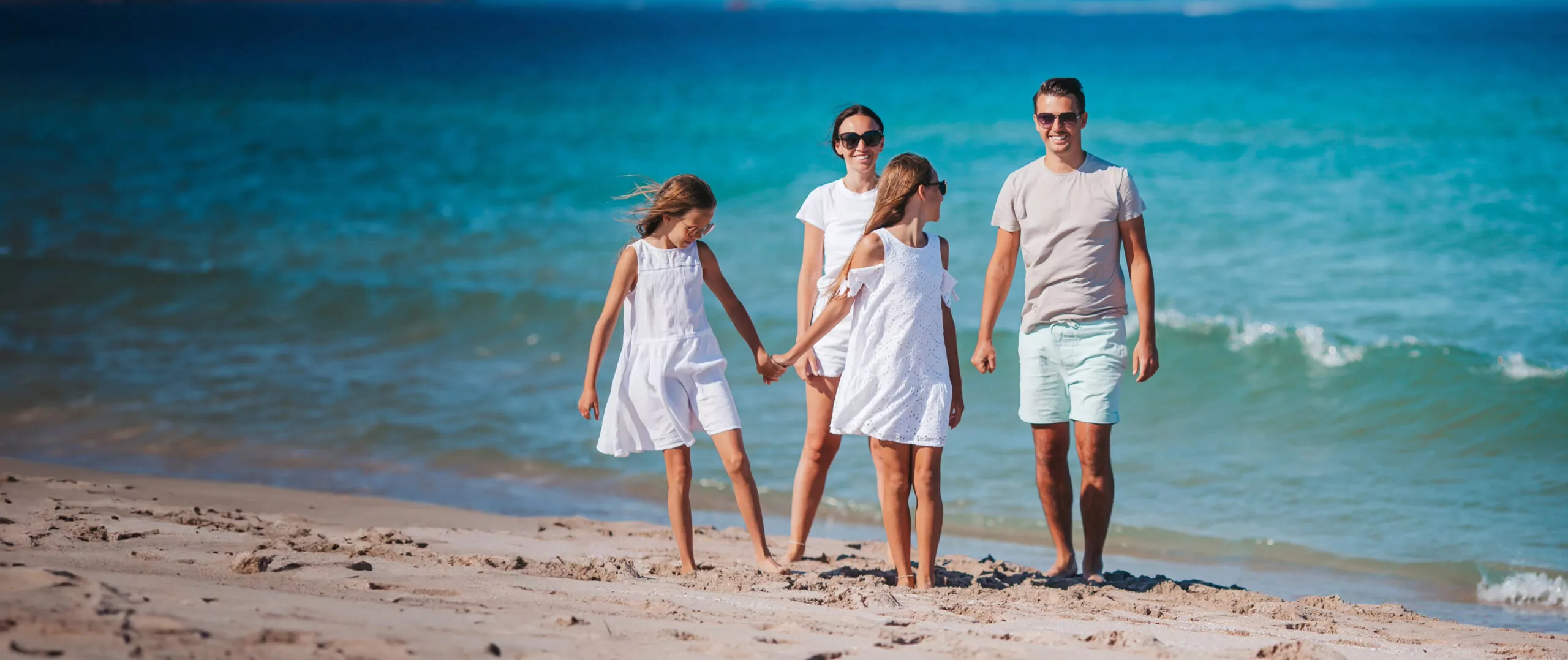 Young Family on a Beach Holiday