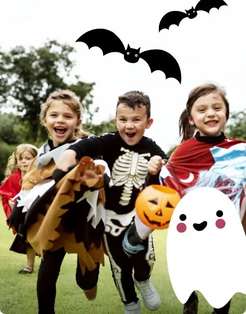 Kids dressed up in halloween costumes running around